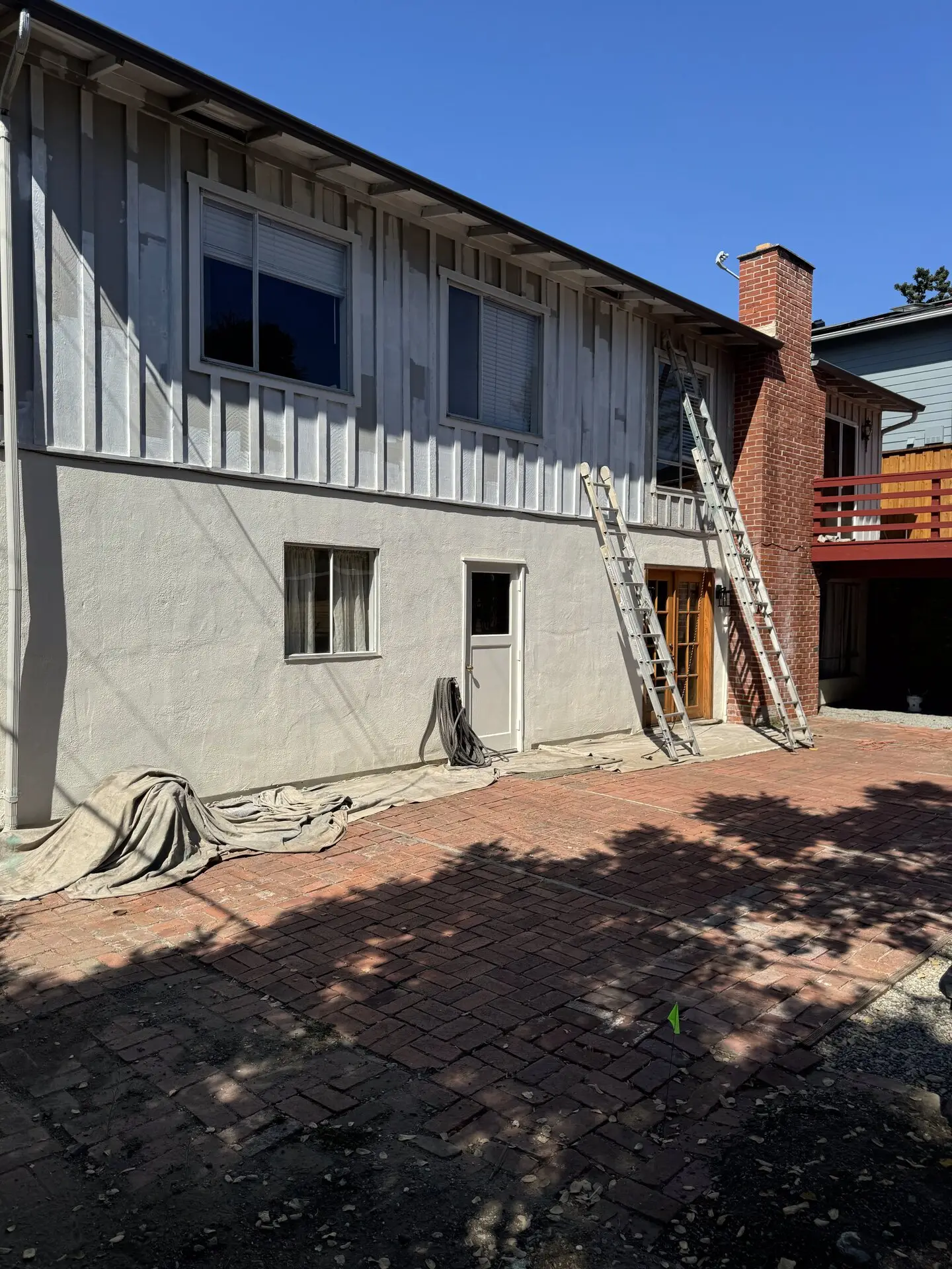 Split-Level Home Repaint with Board-and-Batten Siding photo 4