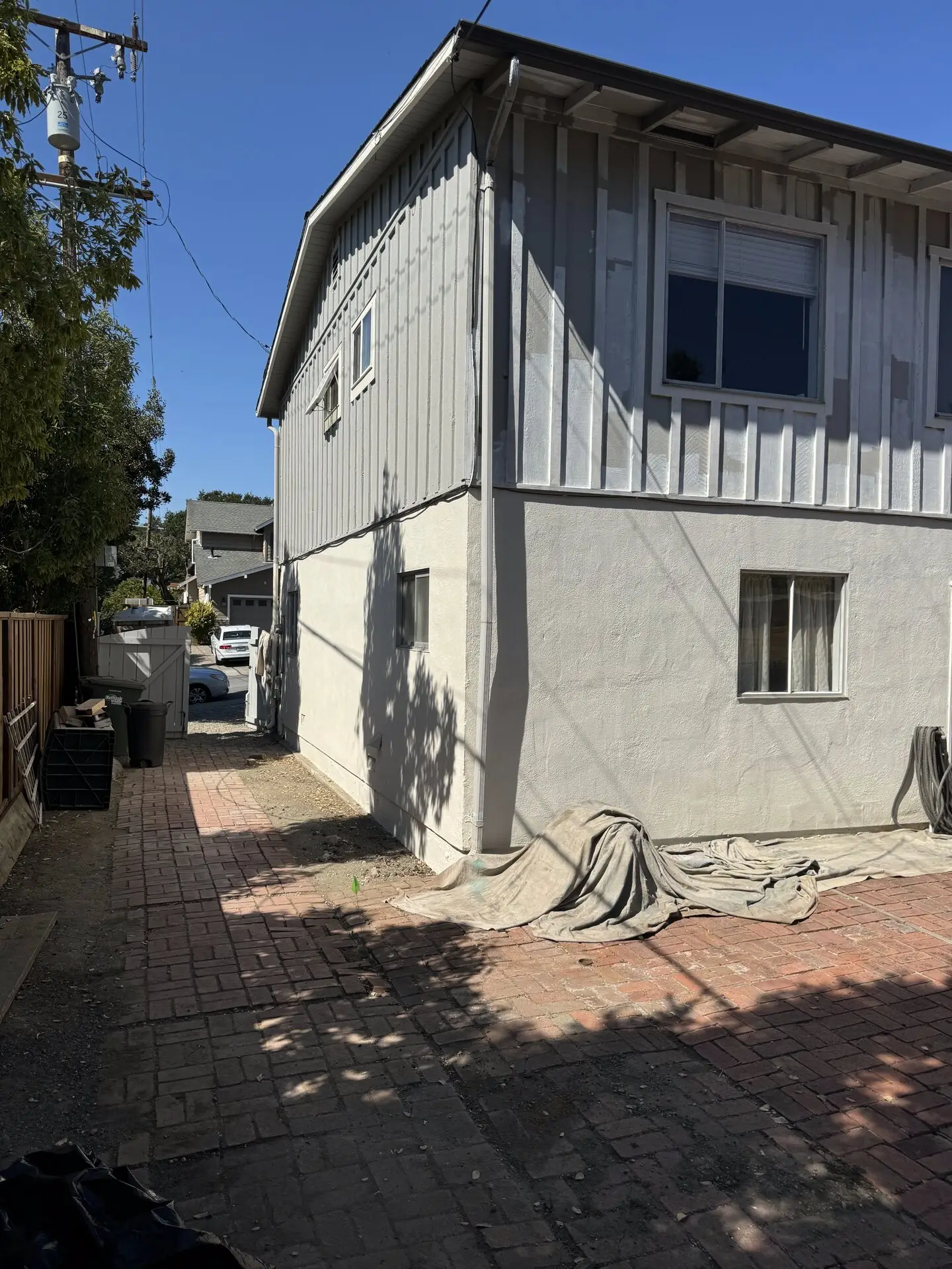 Split-Level Home Repaint with Board-and-Batten Siding photo 3