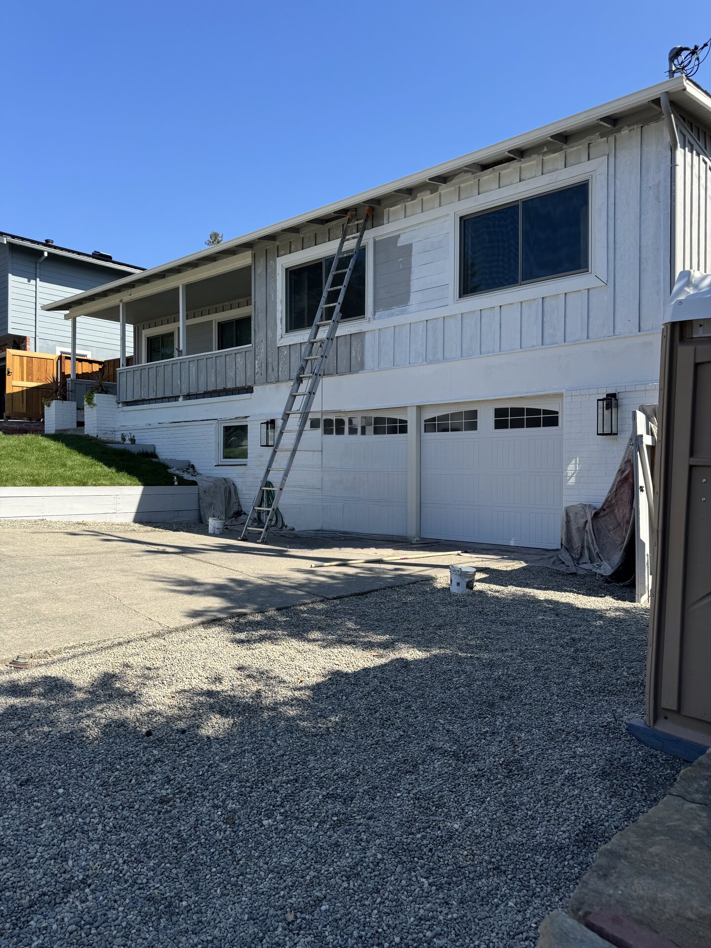 Split-Level Home Repaint with Board-and-Batten Siding photo 2