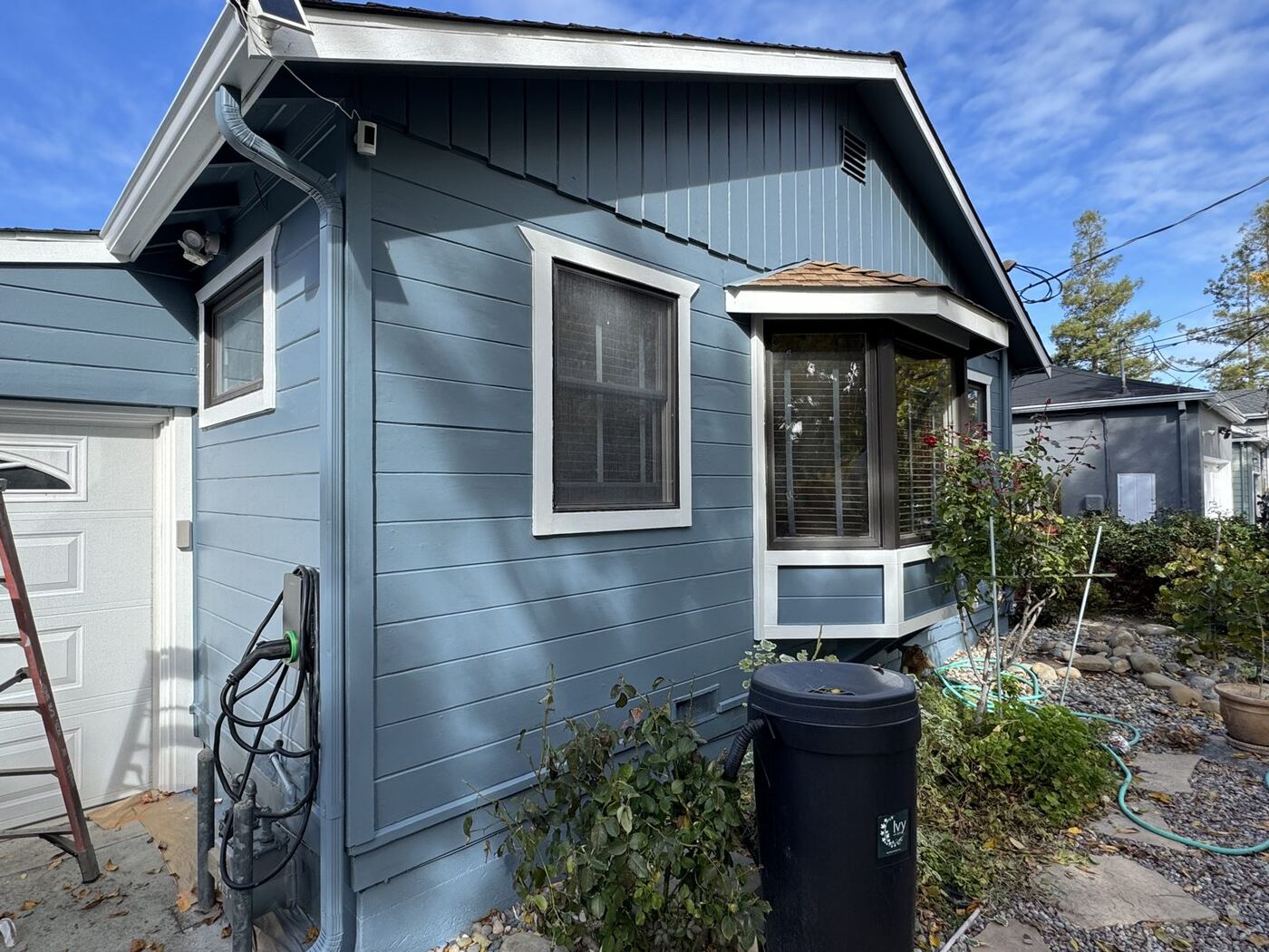 Cottage Exterior Repaint with Cedar Ceiling & Deck Restoration photo 2