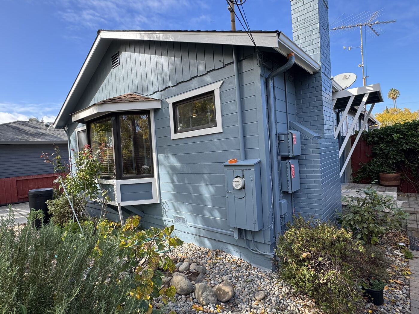 Cottage Exterior Repaint with Cedar Ceiling & Deck Restoration photo 3