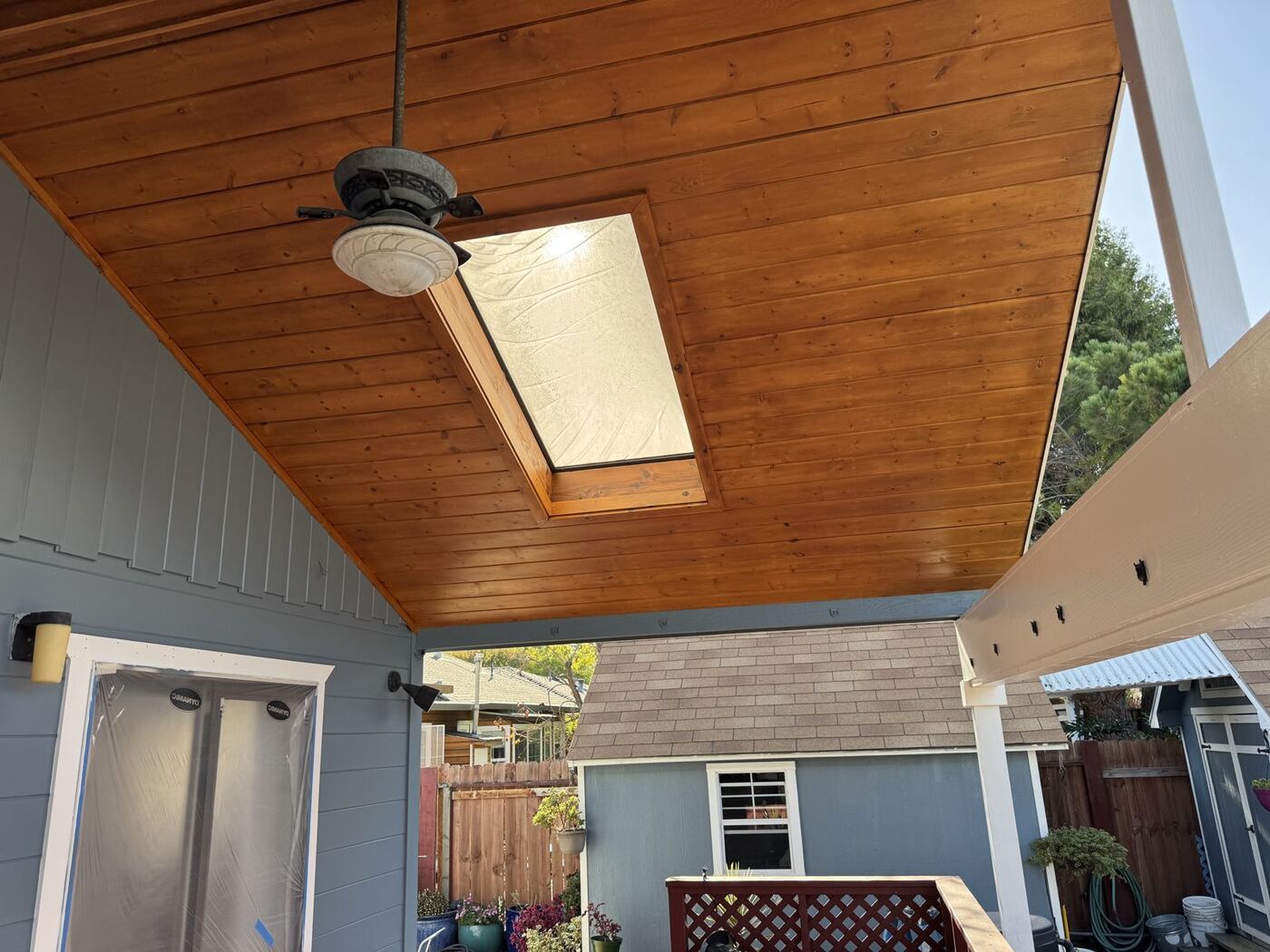 Cottage Exterior Repaint with Cedar Ceiling & Deck Restoration photo 5