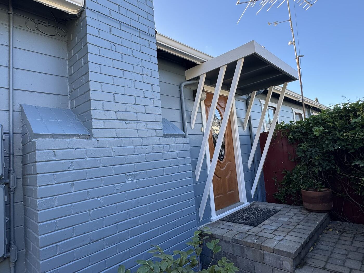Cottage Exterior Repaint with Cedar Ceiling & Deck Restoration photo 7