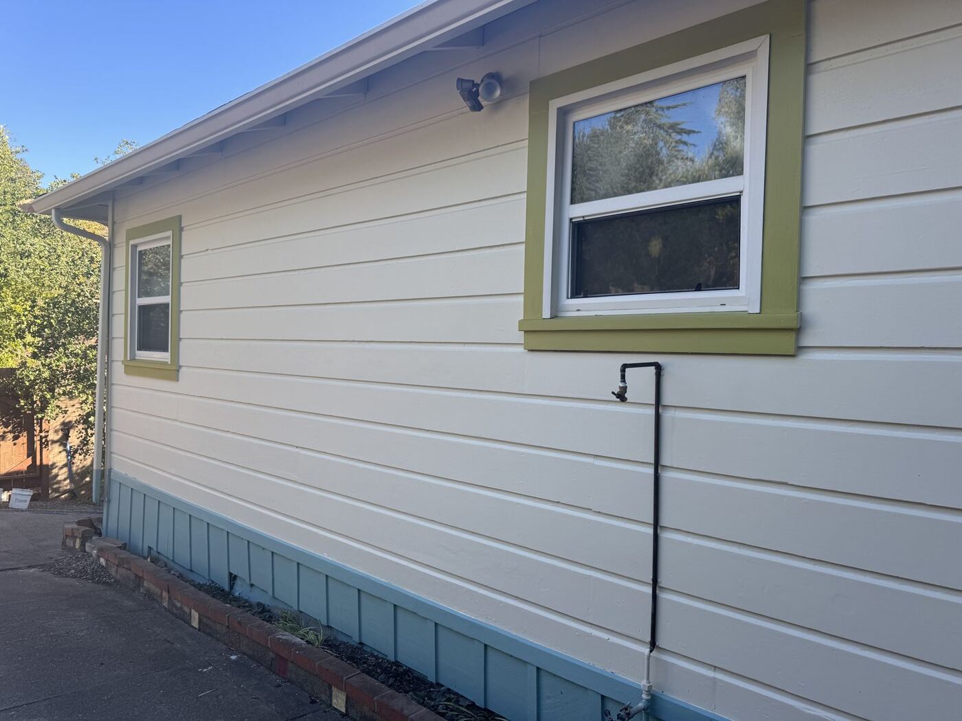 Weathered Siding Restoration & Exterior Repaint photo 5