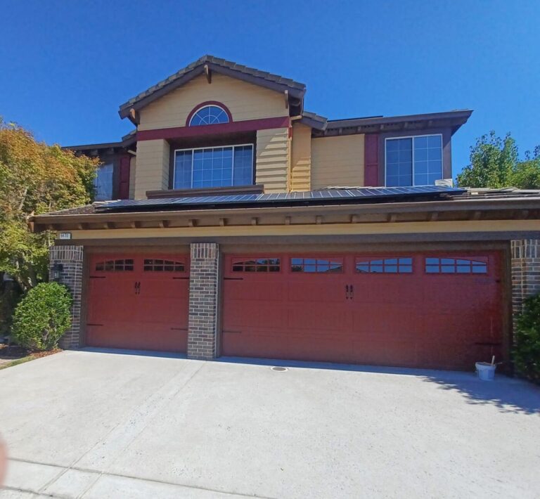 Two-Story Exterior Repaint with New Garage Door Color