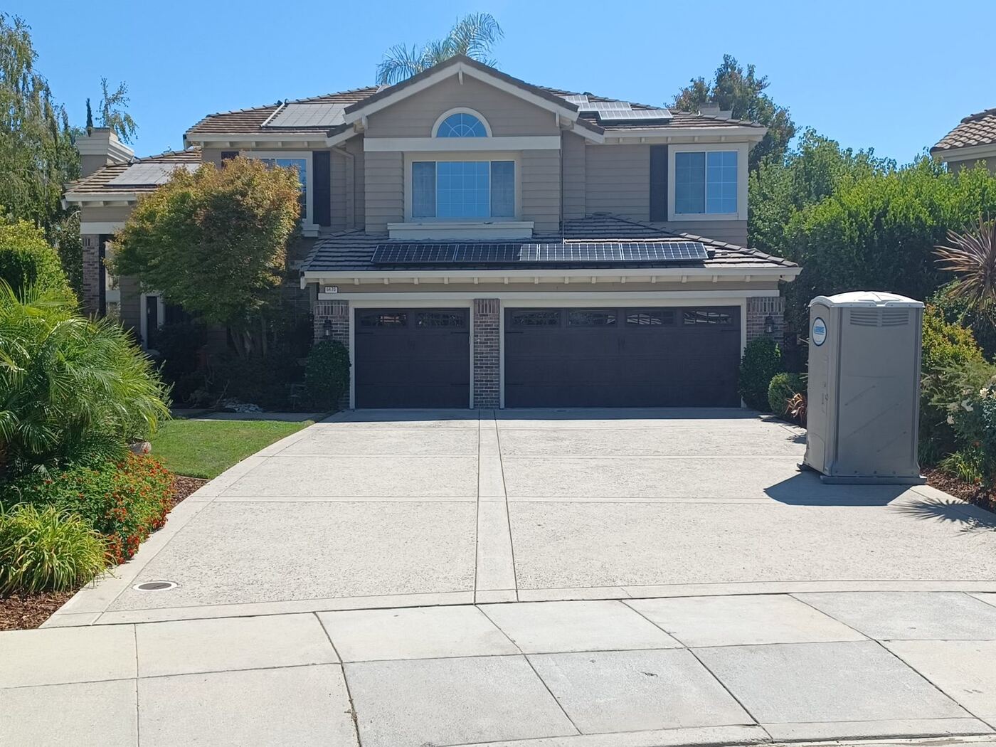 Two-Story Exterior Repaint with New Garage Door Color photo 3
