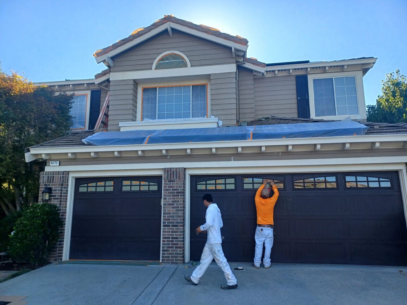 Two-Story Exterior Repaint with New Garage Door Color photo 6