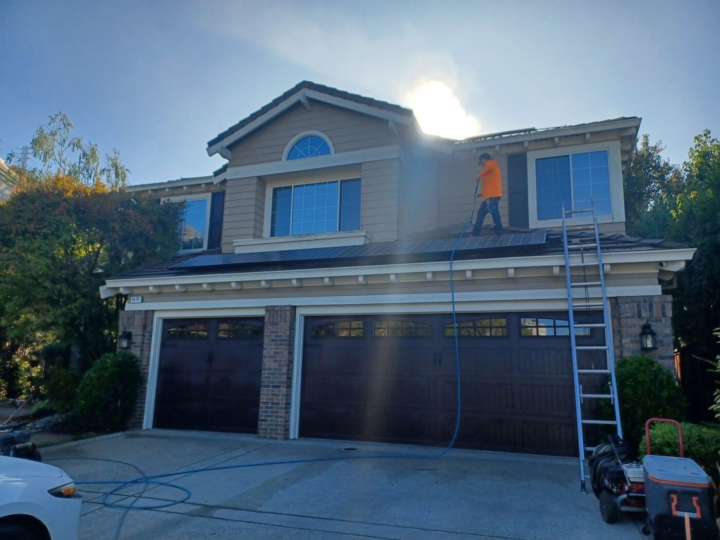 Two-Story Exterior Repaint with New Garage Door Color photo 7