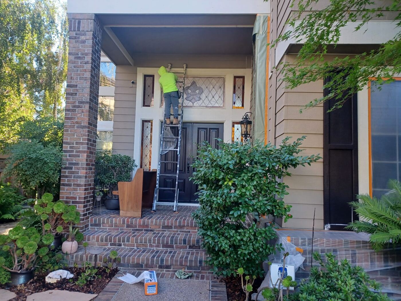 Two-Story Exterior Repaint with New Garage Door Color photo 8