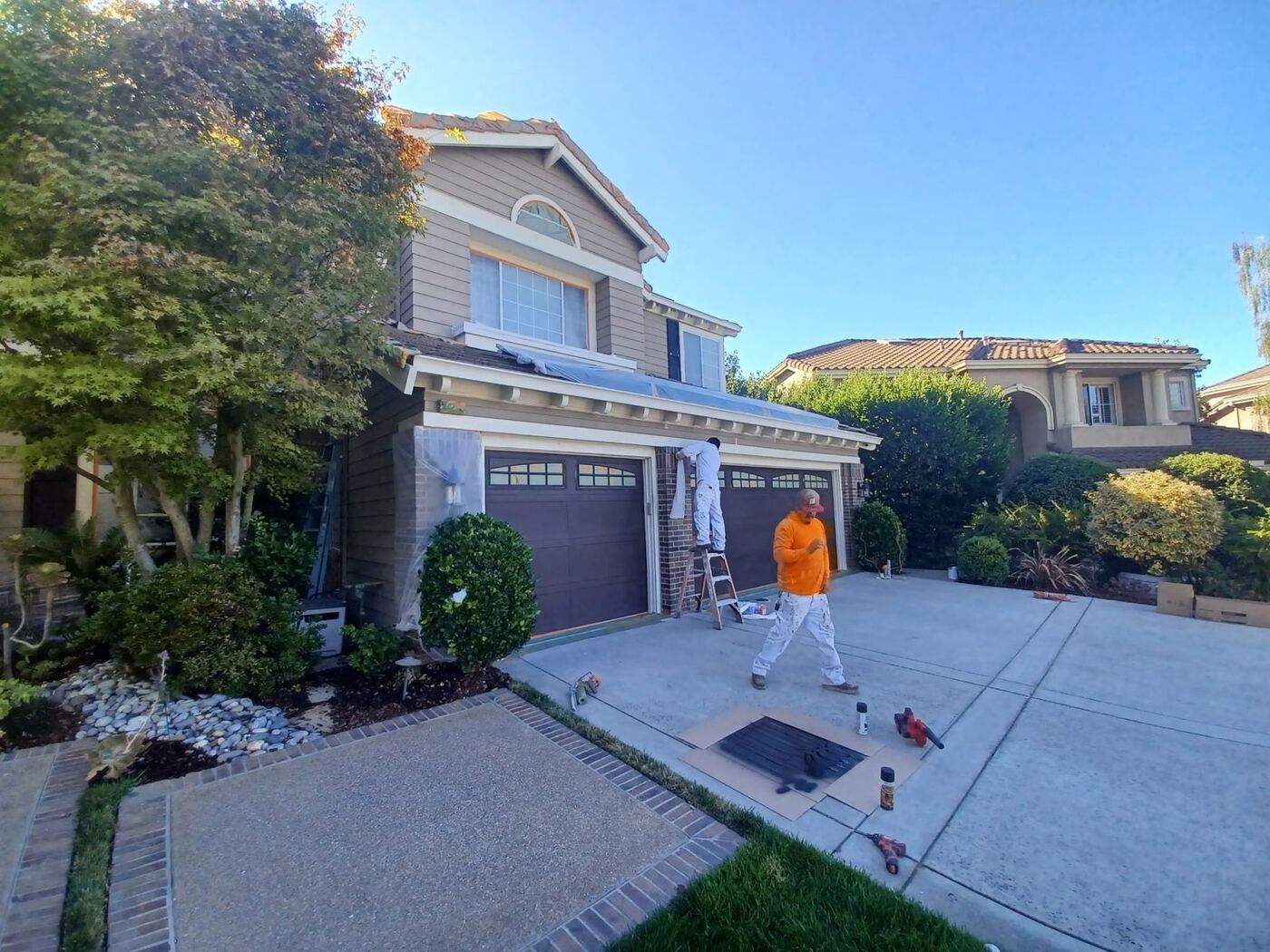Two-Story Exterior Repaint with New Garage Door Color photo 9